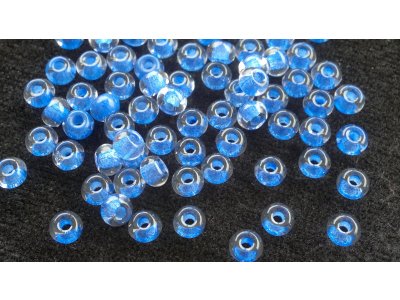 Velkodírkové, mačkané korálky 5 mm - modrý průtah